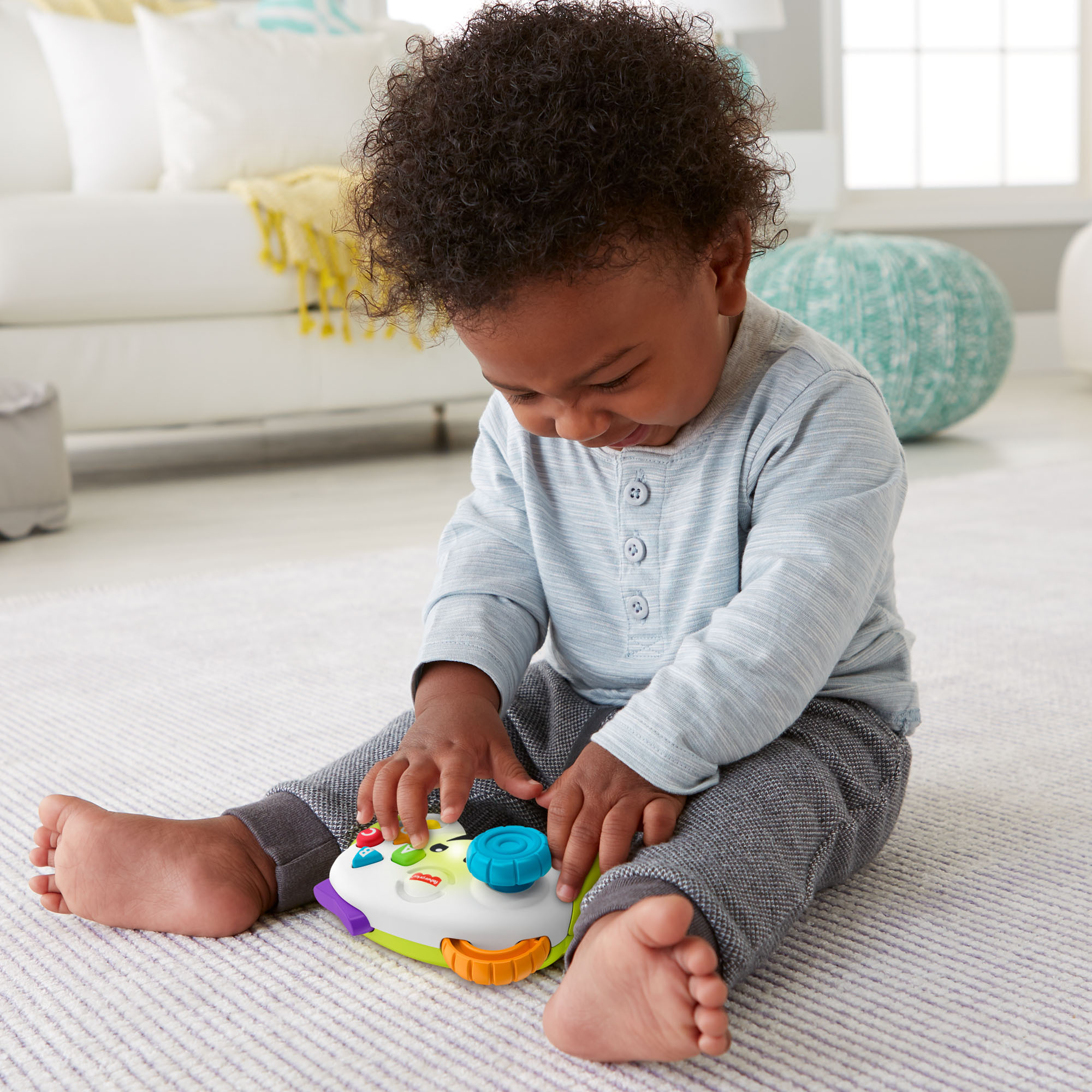Fisher-Price Laugh & Learn -peliohjain